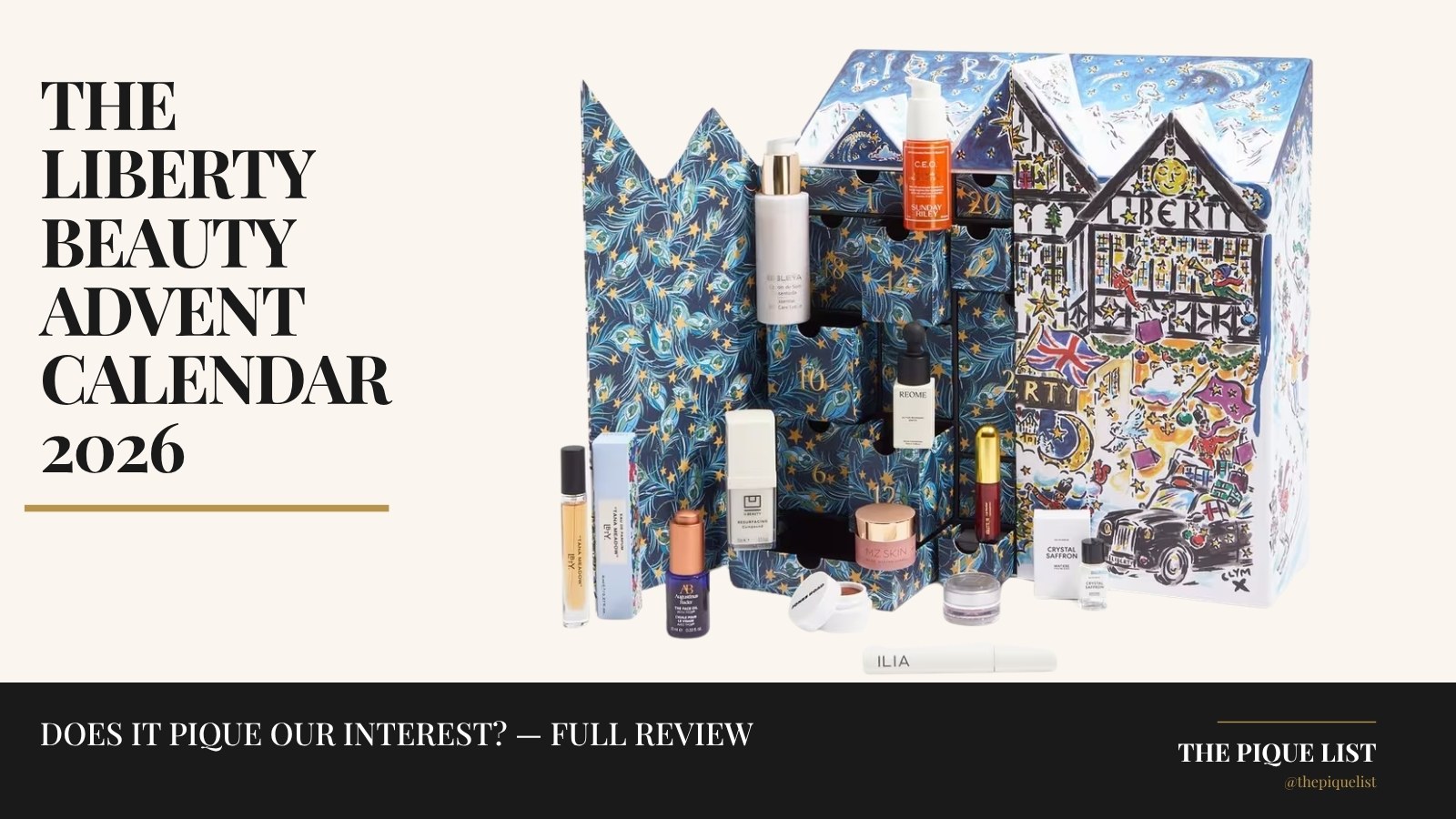 The Liberty Beauty Advent Calendar 2026 in its Clym Evernden illustrated house-shaped box, open with the products displayed in front