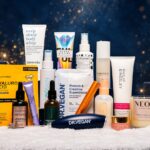 Face the Future Winter Radiance Edit 2026 contents, including Omorovicza, Votary, MZ Skin, Philip Kingsley and NEOM, arranged on snow