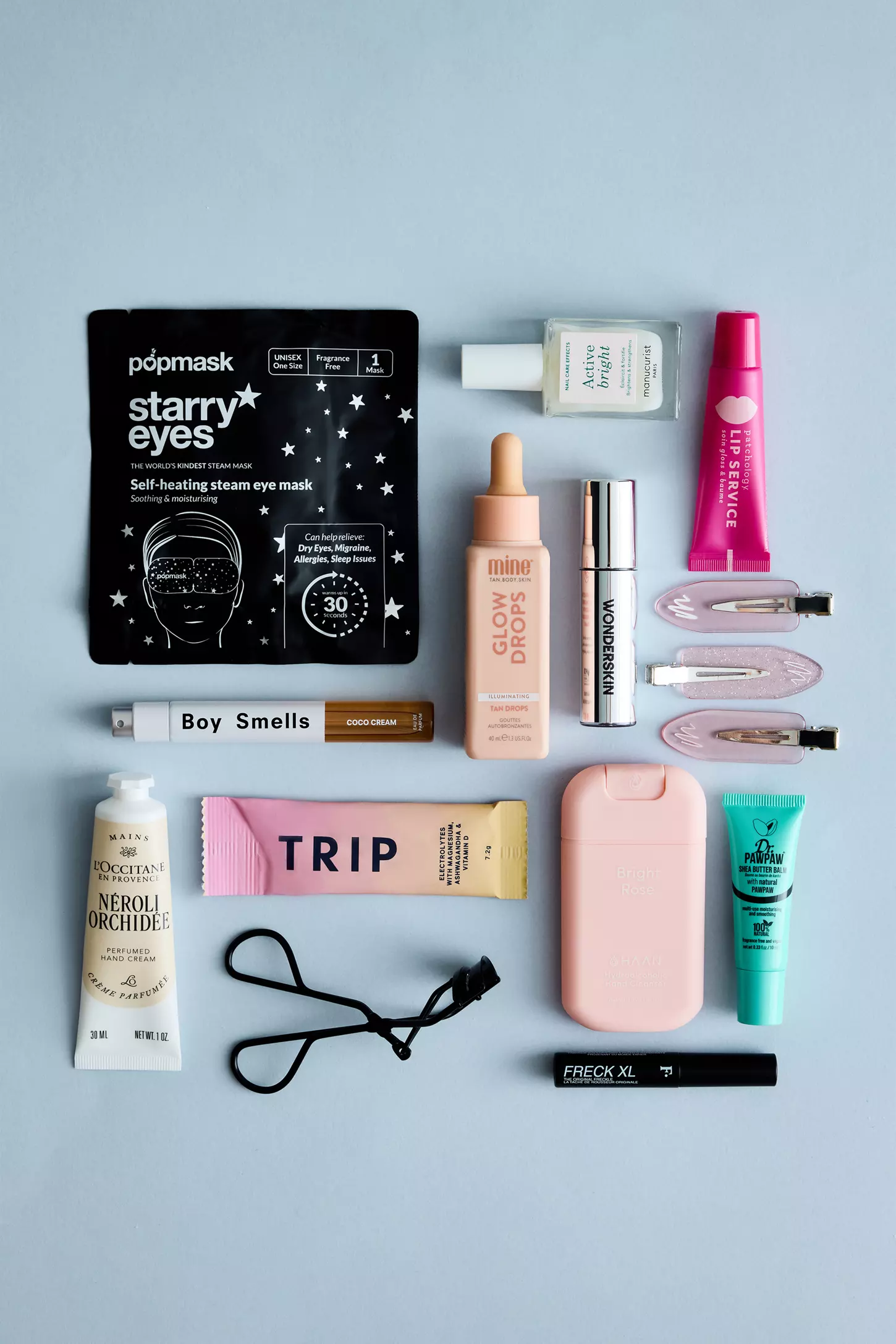 All 13 products from the Anthropologie 12 Days of Beauty Advent Calendar 2026 laid out flat