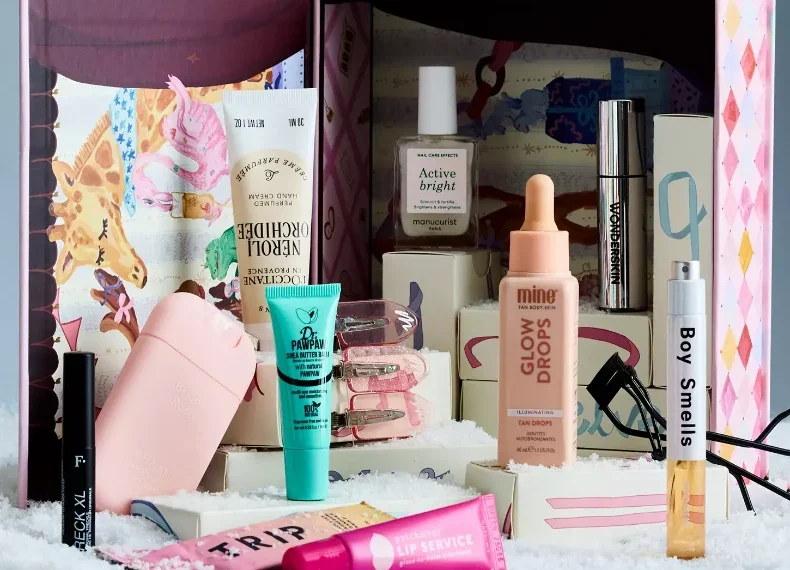 The Anthropologie 12 Days of Beauty Advent Calendar 2026 open with all thirteen products arranged in front of it