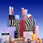 The ASOS Face + Body Advent Calendar 2026 zebra-print box standing closed with its beauty products arranged around it, including Elemis, e.l.f., Biodance, Medicube and Charlotte Tilbury