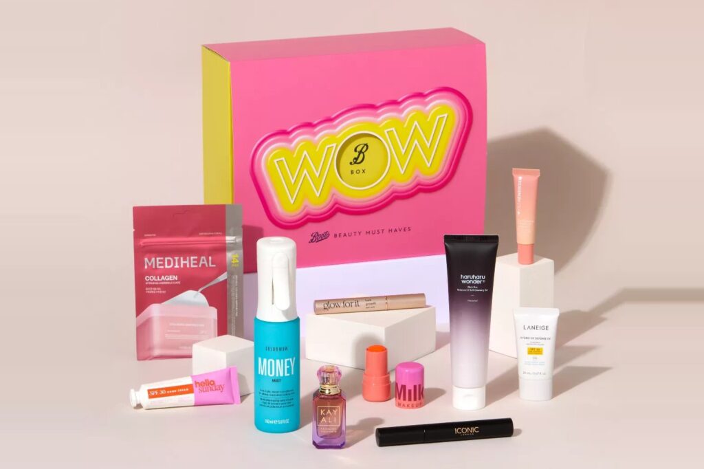 The pink Boots Trending Beauty Box with its ten products arranged in front, including Color Wow Money Mist, a Kayali perfume and a MILK Makeup jelly tint