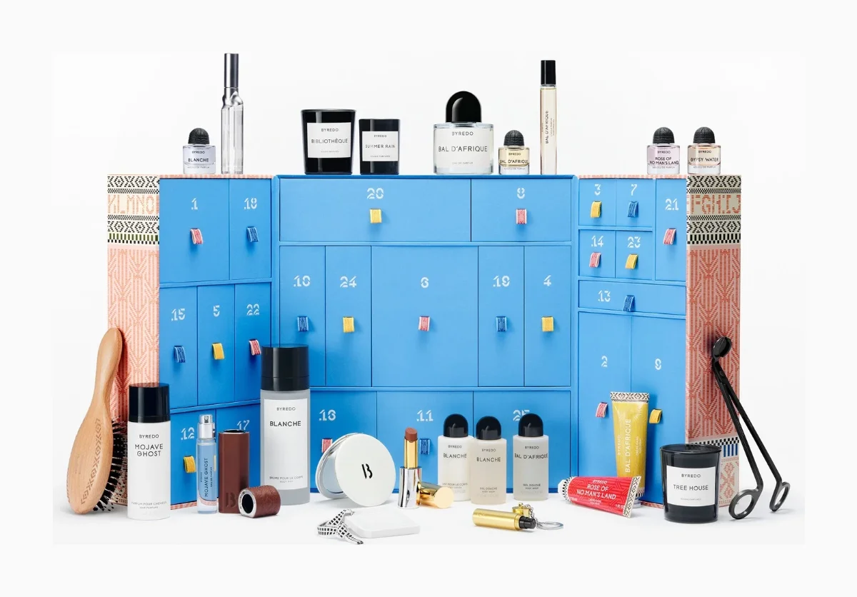 Byredo Advent Calendar 2026 cabinet open with all 25 fragrance and body products arranged in front