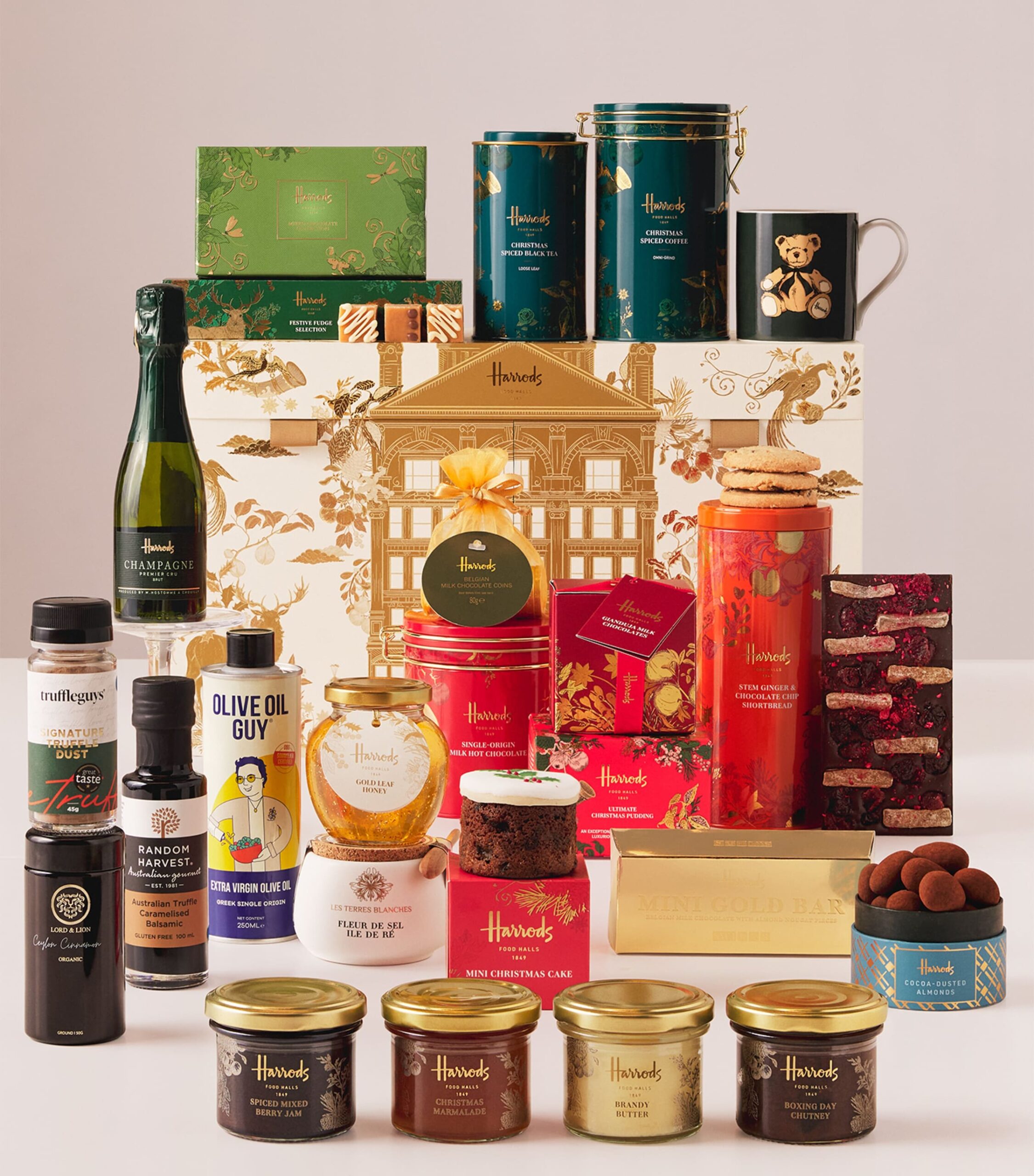 Harrods Food Halls Advent Calendar 2026 with all 25 items arranged around the gold Harrods building calendar box
