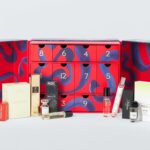 John Lewis Fragrance Advent Calendar 2026 open, showing red and navy drawers with the perfume minis lined up in front