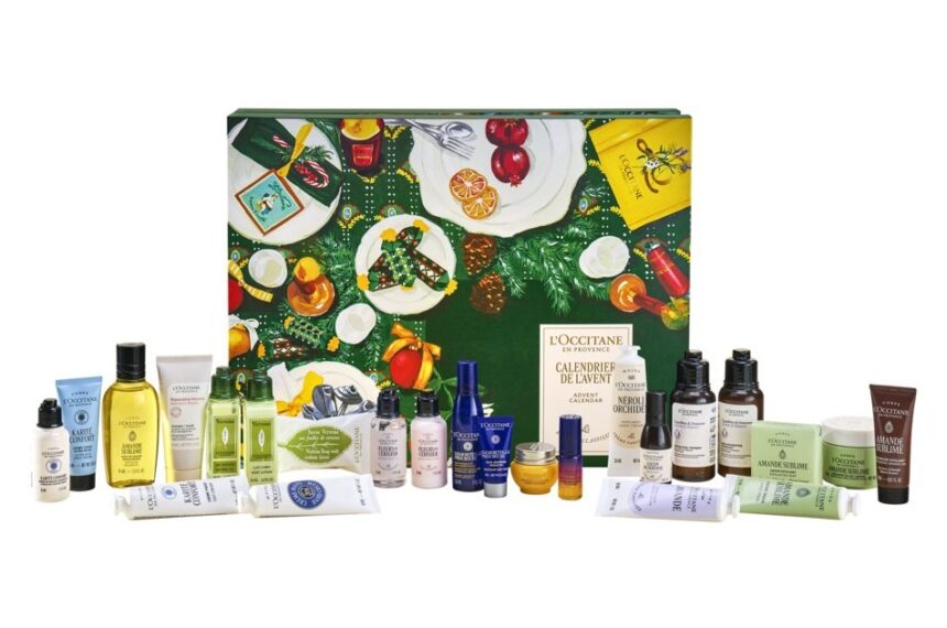 The L'Occitane Classic Advent Calendar 2026 box, with its 24 hand creams, shower oils, lotions and minis lined up in front of it