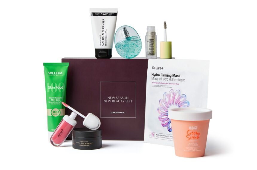 The LOOKFANTASTIC New Season Edit box with its eight products in front: Weleda Skin Food, an Anua mist, The INKEY List cleansing balm, a KIKO Milano lip cream, a Made by Mitchell highlighter, a Sam McKnight mask, an Umberto Giannini scalp scrub and a Dr. Jart+ mask