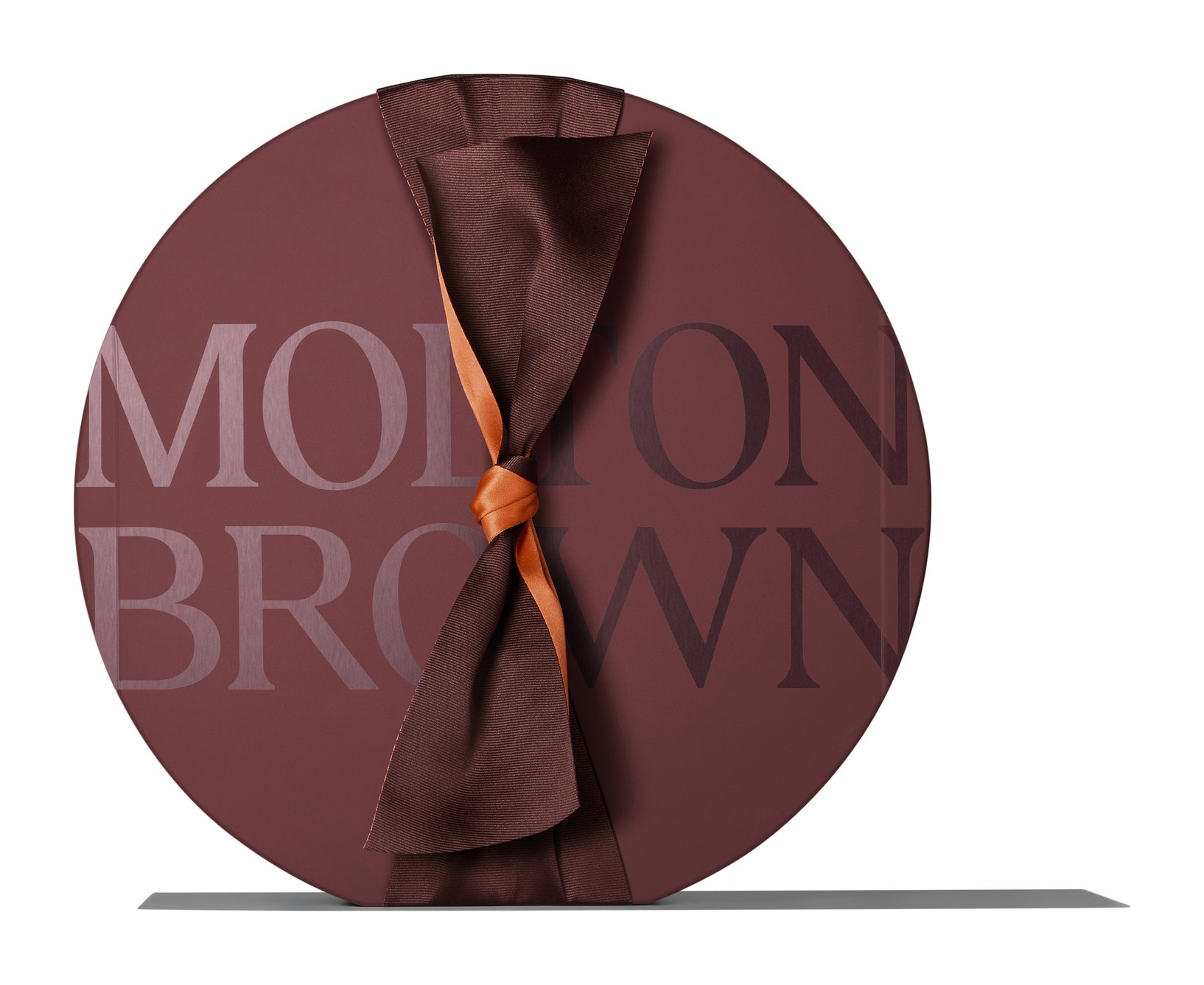 The Molton Brown Advent Calendar 2026 closed, a round box tied with an oversized bow