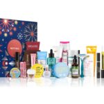 The navy Notino Advent Calendar 2026 box with its 24 beauty products lined up beside it