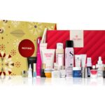 The gold Notino Exclusive Advent Calendar 2026 box with its 25 beauty products and a red pouch lined up in front