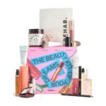The Selfridges Dream Bundle 2026 gift box with its 18 beauty products arranged in front of it