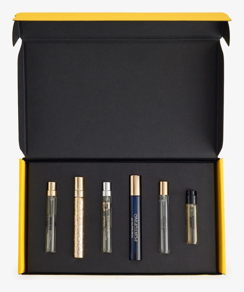 The Selfridges Fragrance Edit Volume 2 open, with six perfume sprays in a row inside the box