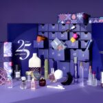 The Fragrance Shop Women's Advent Calendar 2026 open, with its fragrances, candles and extras displayed in front