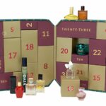 The Perfume Shop Advent Calendar 2026 open, with its burgundy and gold numbered doors and fragrance minis displayed in front