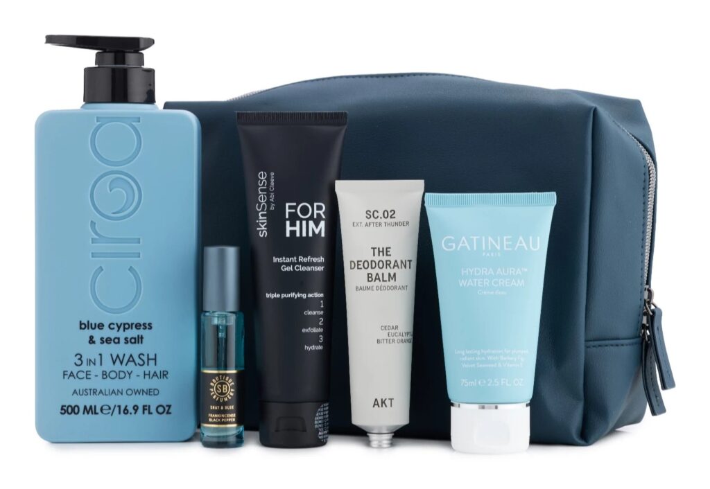 Tili Luxe Grooming Edit 2026 contents in front of the navy wash bag: Ciroa 3 in 1 wash, Shay & Blue fragrance, SkinSense cleanser, AKT deodorant balm and Gatineau water cream
