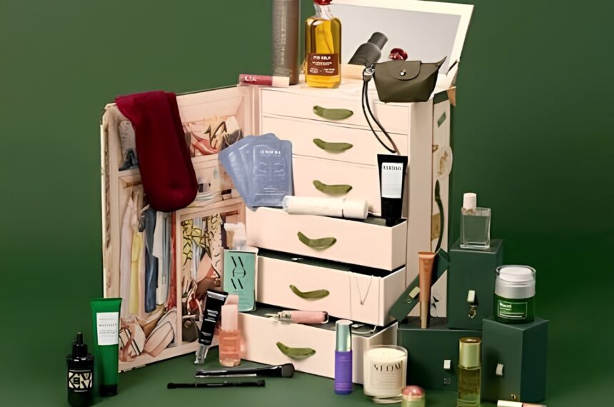 Vogue Festive Calendar 2026, open cream drawer unit filled with fashion and beauty products