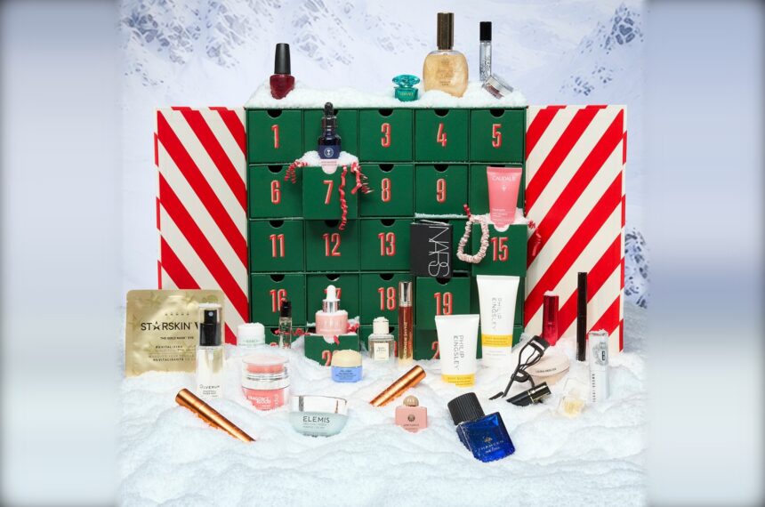 Fenwick Beauty Advent Calendar 2026 open with its numbered drawers, surrounded by the beauty products and fragrances inside