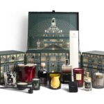 Harrods 12 Days of Home Fragrance Advent Calendar 2026, open, with its candles, room sprays and diffusers set out in front