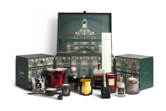 Harrods 12 Days of Home Fragrance Advent Calendar 2026, open, with its candles, room sprays and diffusers set out in front